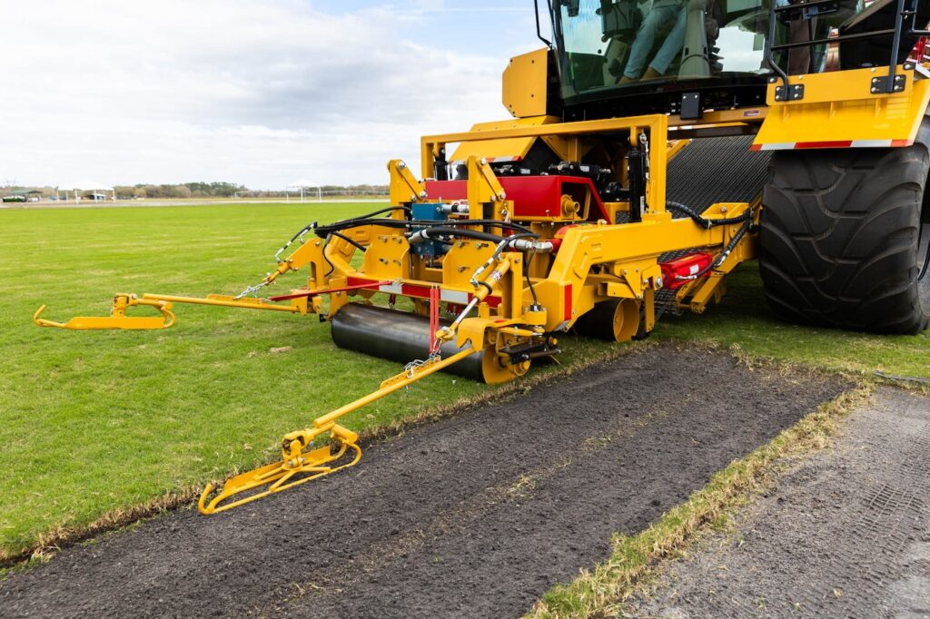 Front shot of the SP sod harvester in action where a client does sod farming.